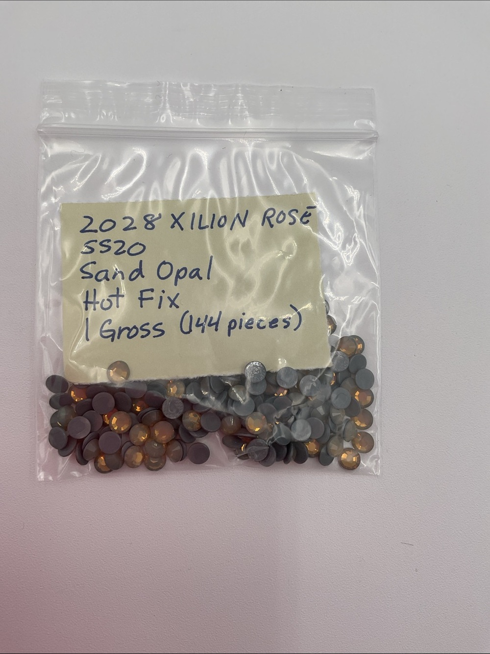 Swarovski • Color: Peridot, 2028 XILION Rose Hotfix Rhinestones